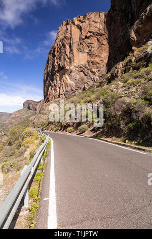 Road though volcanic landscape near Timagada on Gran Canaria, Canary Islands Stock Photo