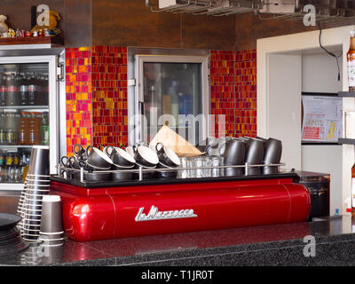 Red Coffee Machine At A Cafe Stock Photo