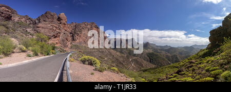 Road though volcanic landscape near Timagada on Gran Canaria, Canary Islands Stock Photo