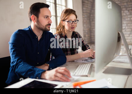 Picture of architects working together in office Stock Photo