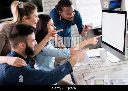 Young architects working on project in office Stock Photo