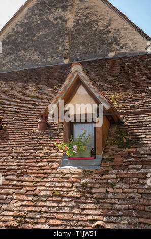 Old tiled roof of house in pilgrimage town of Rocamadour, Episcopal city and sanctuary of the Blessed Virgin Mary, Lot, Midi-Pyrenees, France Stock Photo