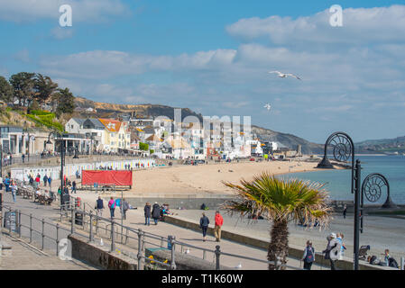 Lyme Regis, Dorset, UK. 27th March 2019. UK Weather: Another a day of glorious warm sunshine and bright blue skies at the seaside resort town of Lyme Regis as the South Coast enjoys more unseasonably high temperatures in the early spring heatwave.  Credit: Celia McMahon/Alamy Live News Stock Photo