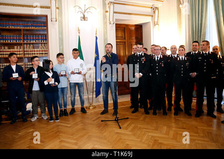 Rome, Italy. 27th Mar, 2019. Matteo Salvini with the students Fabio, Nicolo', Aurora, Adam and Rami and the 12 carabiniere's who saved the students Rome March 27th 2019. The Minister of internal affairs Matteo Salvini meets the students that were on the school bus that was hijacked last week in Crema. Two of the students, Rami and Adam, hailed as heroes for helping saving their classmates when they had been abducted by a Senegalese with Italian citizenship bus driver who tried to set fire to the school bus. photo di Samantha Zucchi/Insidefoto Credit: insidefoto srl/Alamy Live News Stock Photo
