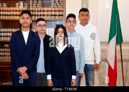 The students Fabio, who tried to calm down the highjacked, Nicolo', who begged the hijacked to take him and relate his mates, Aurora, that, took as a hostage kept the calm, and Adam and Rami who phone the police whit an hidden mobile. Rome March 27th 2019. The Minister of internal affairs Matteo Salvini meets the students that were on the school bus that was hijacked last week in Crema. Two of the students, Rami and Adam, hailed as heroes for helping saving their classmates when they had been abducted by a Senegalese with Italian citizenship bus driver who tried to set fire to the school bus Stock Photo