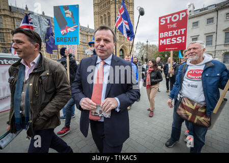 Aaron Banks (C), co-founder of the leave EU campaign and Andy Wigmore (L) the communications director, are both pursued through Westminster by pro-EU supporters. Banks was previously one of the largest donors to the UK Independence Party (UKIP) and bankrolled Nigel Farage’s campaign to leave the EU. London, UK. Stock Photo