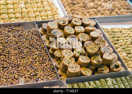 Pistachio and honey traditional Turkish delight in a sweet shop. Sweet and spice Market of Istanbul, Turkey Stock Photo