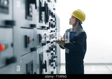 Technicians work in a factory Stock Photo