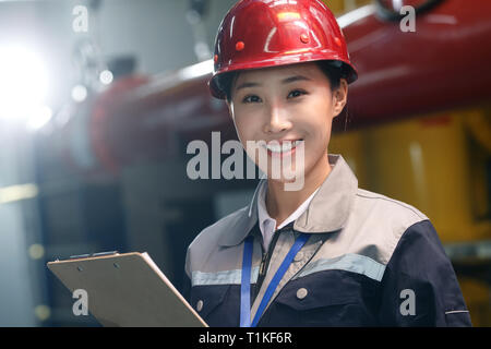 Technicians work in a factory Stock Photo