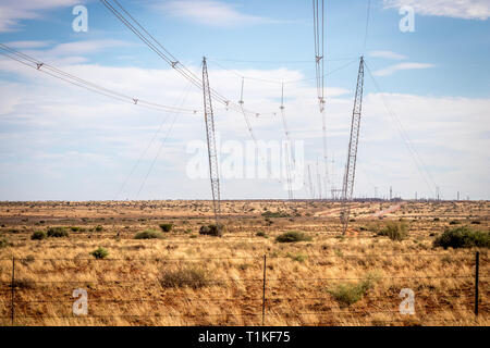 Overhead high voltage power lines Stock Photo