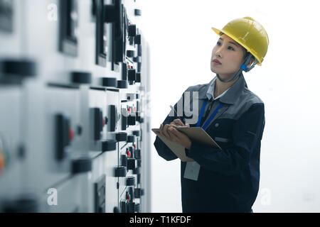 Technicians work in a factory Stock Photo