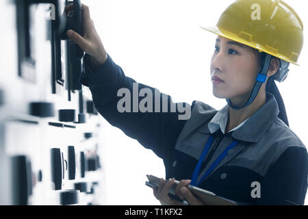 Technicians work in a factory Stock Photo