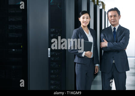 Technical personnel in machine room inspection Stock Photo