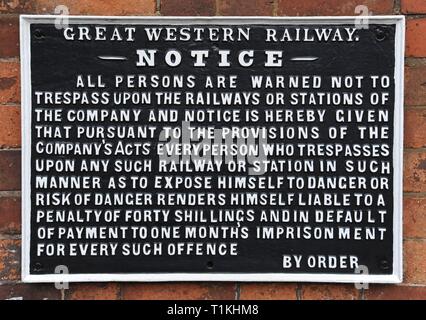 A cast Iron GWR notice warning passengers about trespassing on Bewdley station, Severn Valley Railway Worcestershire Heritage Railway Stock Photo