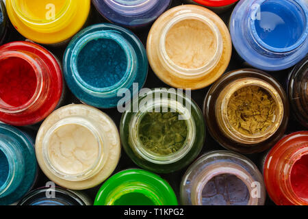 Colorful stained glass paints or oil, acrylic paints close up, top view. Stock Photo