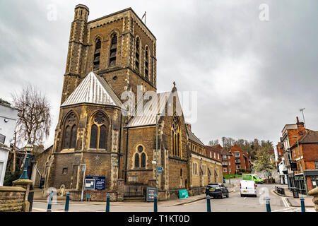 Guildford, United Kingdom - March 23, 2019: Street view of the St Nicolas Parish Church From The Town Bridge in the medieval city of Guildford, Englan Stock Photo