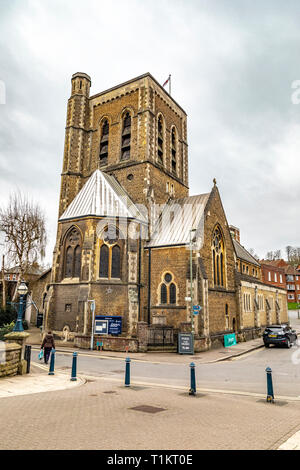 Guildford, United Kingdom - March 23, 2019: Street view of the St Nicolas Parish Church From The Town Bridge in the medieval city of Guildford, Englan Stock Photo