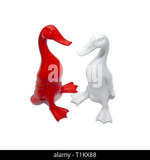 Two colorful goose sculptures on a white background Stock Photo