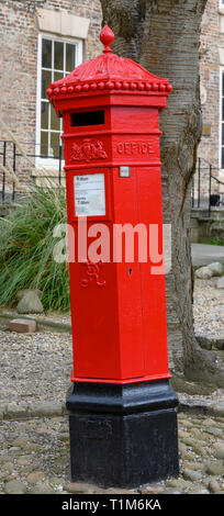 Red Victorian post box on Palace Green, Durham, Northumberland, England, UK Stock Photo