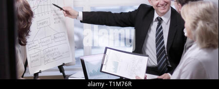 business partners discussing profit from new business project Stock Photo