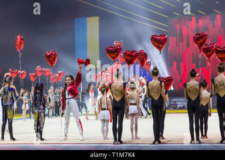 KYIV, UKRAINE - MARCH 17, 2019:  Darina Krasnovetska and dancing group of tournament participants perform at gala concert of Deriugina Cup Grand Prix  Stock Photo