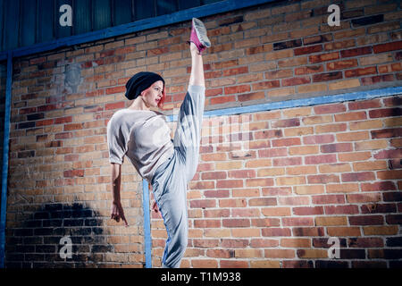 Agile female modern dancer performing Stock Photo