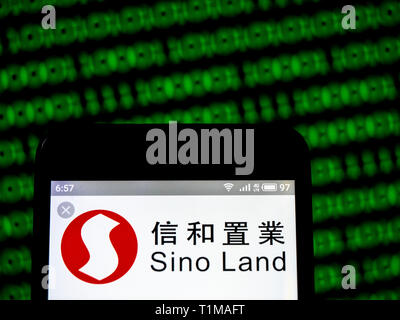 In this photo illustration a Sino Group logo seen displayed on a smart phone. Stock Photo