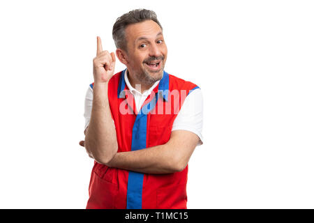 Happy supermarket or hypermarket male employee holding index finger up as good idea concept isolated on white background Stock Photo