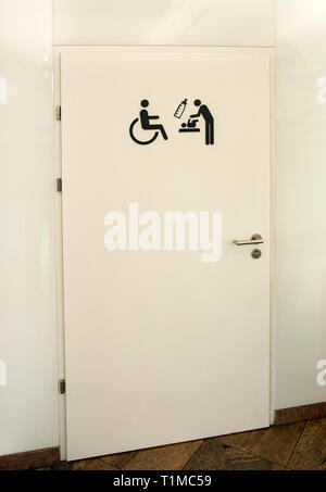 Handicap and mothers room with kids at public building Stock Photo