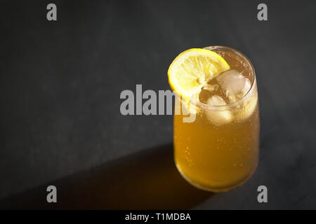 Ice lemon tea with a slice of lemon isolated with copy space Stock Photo