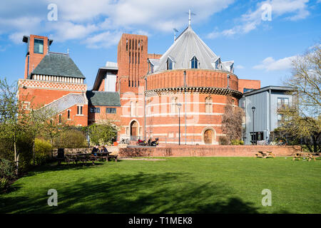 The rear view of the Royal Shakespeare Company theatre at Stratford upon Avon from the river walk and park on a sunny day. Stock Photo