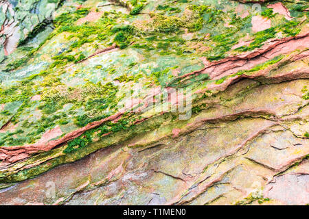 Colourful sedimentary rocks formed by the accumulation of sediments – natural rock layers backgrounds, patterns and textures - abstract graphic design Stock Photo