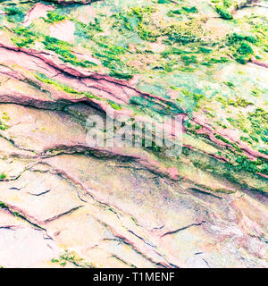 Colourful sedimentary rocks formed by the accumulation of sediments – natural rock layers backgrounds, patterns and textures - abstract graphic design Stock Photo