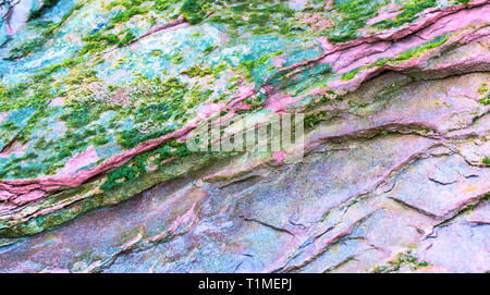 Colourful sedimentary rocks formed by the accumulation of sediments – natural rock layers backgrounds, patterns and textures - abstract graphic design Stock Photo