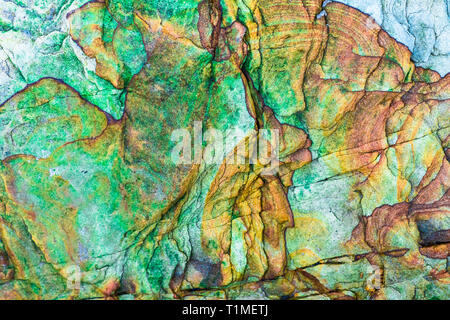 Colourful sedimentary rocks formed by the accumulation of sediments – natural rock layers backgrounds, patterns and textures - abstract graphic design Stock Photo