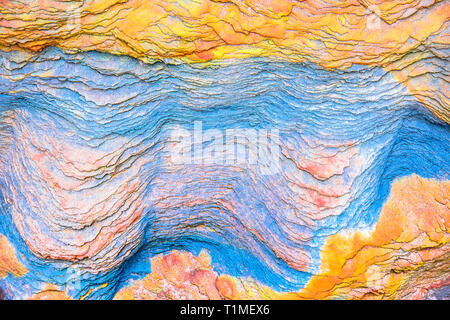 Colourful sedimentary rocks formed by the accumulation of sediments – natural rock layers backgrounds, patterns and textures - abstract graphic design Stock Photo