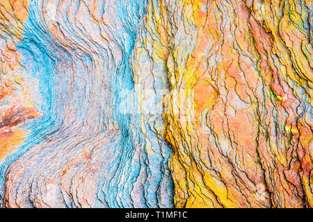 Colourful sedimentary rocks formed by the accumulation of sediments – natural rock layers backgrounds, patterns and textures - abstract graphic design Stock Photo