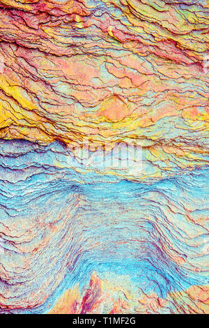 Colourful sedimentary rocks formed by the accumulation of sediments – natural rock layers backgrounds, patterns and textures - abstract graphic design Stock Photo