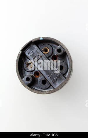 Antique switch on off bakelite back, isolated on white background, close-up Stock Photo