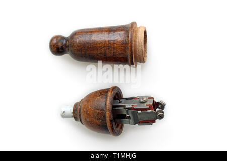 Antique wooden handle switch 40s/60s, white bakelite 50s/60s, isolated on white background, closeup Stock Photo