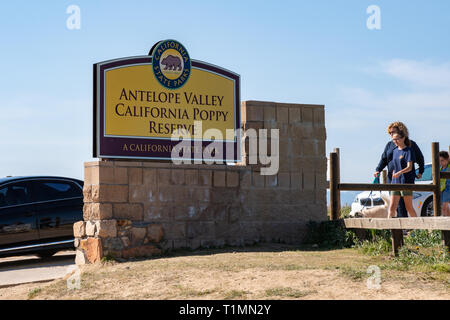 Lancaster, California - March 24, 2019: Crowds of tourists enter the Antelope Valley Poppy Reserve State Park to see the poppies during the superbloom Stock Photo