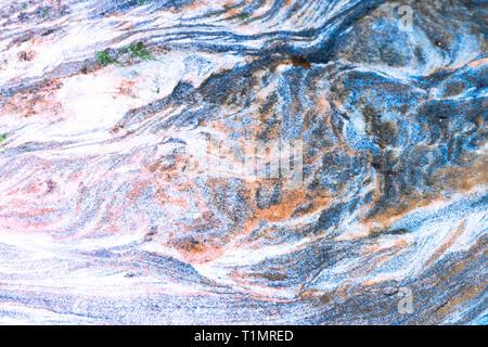 Blue, orange, white, yellow sedimentary rocks - colourful rock layers formed through cementation and deposition - abstract graphic design backgrounds, Stock Photo