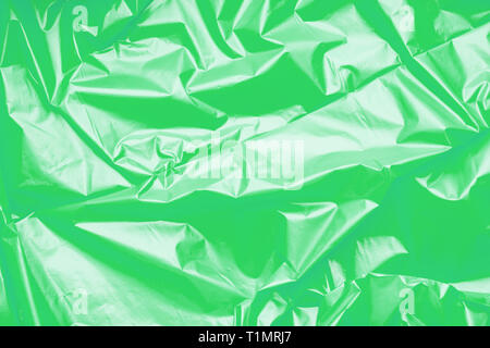 Green polyethylene texture. Background exhaust cellophane package Stock Photo