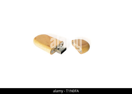 Wooden USB flash memory isolated on a white background, modern combination of technology and natural materials Stock Photo