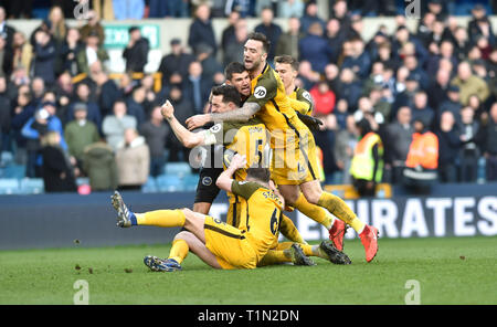 Brighton's players celebrate winning the penalty shoot out during the FA Cup quarter final match between Millwall and Brighton & Hove Albion at The Den London . 17 March 2019 Editorial use only. No merchandising. For Football images FA and Premier League restrictions apply inc. no internet/mobile usage without FAPL license - for details contact Football Dataco Stock Photo