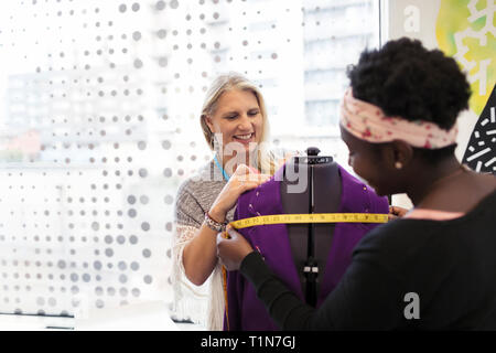 Female fashion designers working in studio Stock Photo