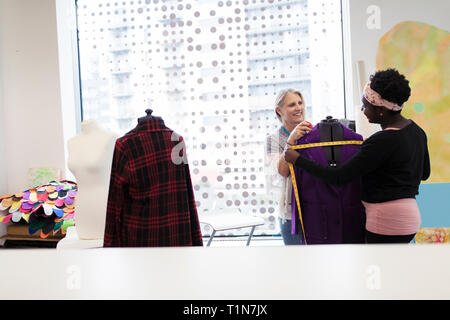 Fashion designers working in studio Stock Photo