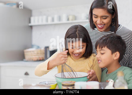 Family baking in kitchen Stock Photo