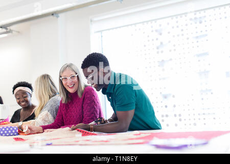 Fashion designers working in studio Stock Photo