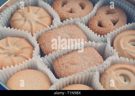 Cookies in a metal tin. Close-up. Macro Stock Photo